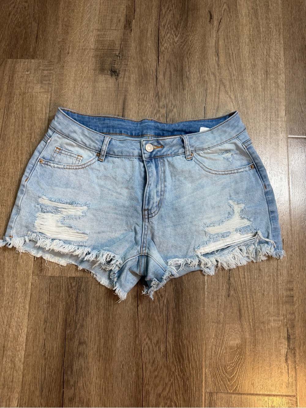 Levi's Light Wash Frayed Hem Denim Shorts